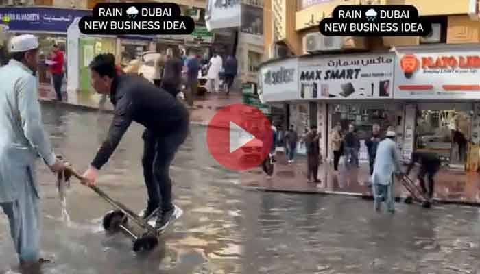 ویڈیو: دبئی میں موسلادھار بارش ،   پاکستانیوں نے پیسے کمانے کا نیا جگاڑ ڈھونڈ لیا