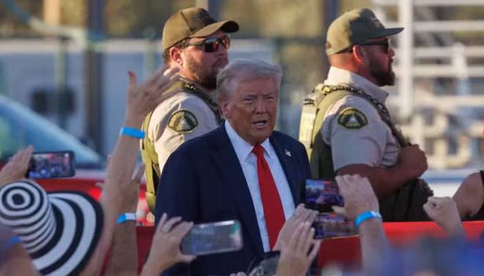 armed man arrested from trump rally in CA