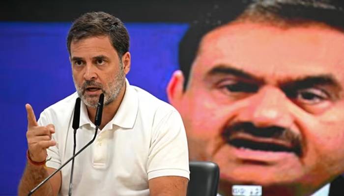 rahul gandhi demanded immediate arrest of adani