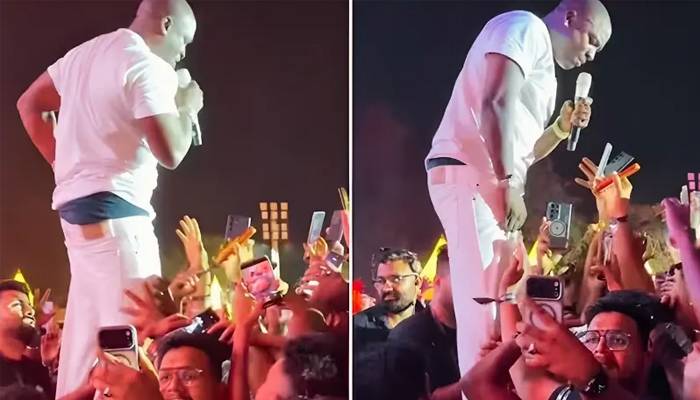بنگلورو:دوران کنسرٹ مداح کی گلوکارایکون کی پینٹ اتارنے کی کوشش